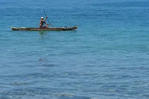 Westafrican Prints: Africa, SA£o Toma and Principe. Fisherman in traditional dugout canoe