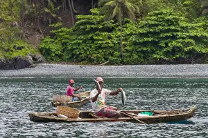 Equatorial Prints: Africa, SA£o Toma and Principe. Fishermen in their traditional dugout canoes showing