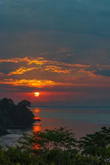 Africa, SA£o Toma and Principe. Sunset on the coast of Sao Toma