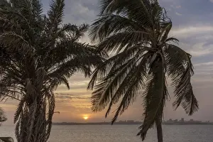Goree Prints: Africa, Senegal, Dakar. sunset on the island Gora e with the skyline of Dakar in