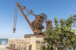 Iron Prints: Africa, Senegal, Saint-Louis. An old steam crane