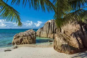 Archipelago Collection: Africa, Seychelles, La Digue. Anse Patates beach with its beautiful granite rocks