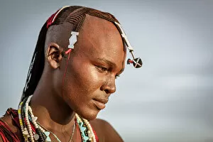 Images Dated 19th December 2022: Africa, Tanzania, Manyara Region. Portrait of a young Maasai warrior