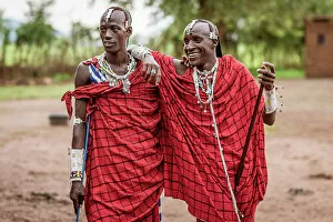 Images Dated 19th December 2022: Africa, Tanzania, Manyara Region. Maasai men dressed in typical warrior dress with decoration