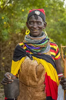 Jewelry Collection: Africa, Uganda, Karamoja. Namalu. A beautiful elder woman during a wedding ceremony traditionally