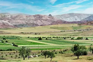 Social Issues Prints: Agricultural fields in the green valley with Rif mountain range on background