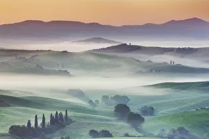 Agricultural landscape in fog - Italy, Tuscany, Siena, Val d Orcia