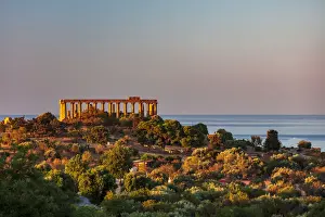 Agrigento, Sicily. Concordia Temple in the Valley of Temples at sunrise with the sea in