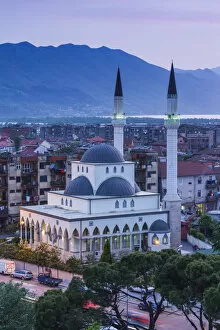 Images Dated 2nd October 2013: Albania, Shkodra, elevated view of Zogu 1 Boulevard and mosque, dusk