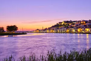 Hilltop Collection: Alcacer do Sal and Sado river at dusk. Alentejo, Portugal