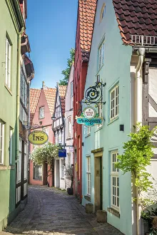 Alley with colorful houses in the historic Schnoor district, Bremen, Germany