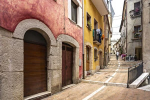 Alleys in the historic center of Campobasso with colored facades and brick paving