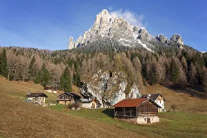 Trento Prints: Alpine huts in Fosne, Primiero valley, Dolomites, Italy. Cimerlo mount in the background