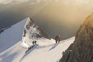 Alpinists along normal route to Nadelhorn, a 4000 peak in Sass Fe valley
