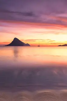 Amazing Prints: Amazing sunrise on the beach of Porto Taverna with the Tavolara Island in the background