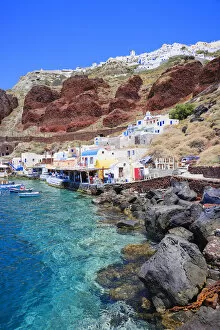 Ammoudi fishing village overlooked by Oia village on the cliff top above, Oia, Santorini
