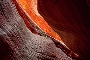 Desolate Prints: Ancient footholds in sandstone at Peek-a-Boo slot canyon near Kanab, Utah, USA