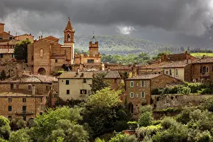 Montalcino Prints: The ancient village of Montisi against a stormy sky