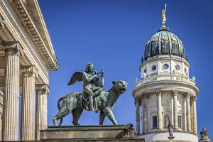 Angel statue on lion at Berlin Concert Hall and French Cathedral, Gendarmenmarkt, Berlin Angel statue on lion at Berlin Concert Hall and French Cathedral, Gendarmenmarkt, Berlin