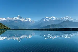 Range Prints: Annapurna mountain range reflected in hotel pool at Sarangkot near Pokhara