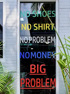 Cayo Caulker Prints: Announcement at the Shop Window