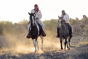 Images Dated 6th December 2012: Two Apache Indians on horseback at the Apache Spririt Ranch near Tombstone, riding