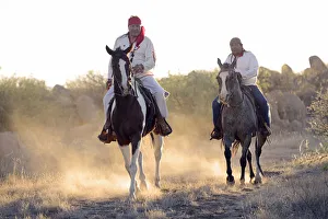 Dust Gallery: Two Apache Indians on horseback at the Apache Spririt Ranch near Tombstone, riding