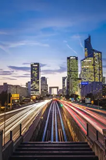 Highway Prints: Arc de la Da fence and La Da fence Skyscaper during the night and carss lights (Paris