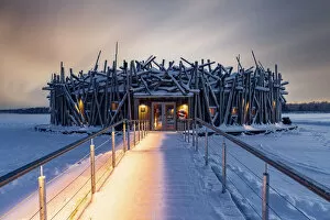 Frozen Gallery: Arctic Bath Hotel and snowy walkway on frozen river Lule, Harads, Lapland, Sweden