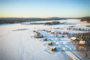Floating Prints: Arctic Bath Spa Hotel and cabins in the snowcapped landscape, Harads, Lapland, Sweden