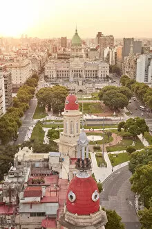 The Argentine National Congress and La Inmobiliaria builidng domes at sunset, Monserrat, Buenos Aires, Argentina