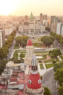Images Dated 11th March 2022: The Argentine National Congress and La Inmobiliaria builidng domes at sunset, Monserrat