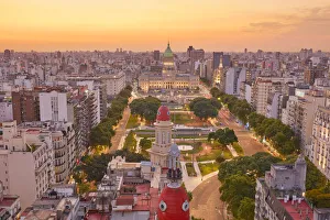 Images Dated 11th March 2022: The Argentine National Congress and La Inmobiliaria builidng domes at sunset, Monserrat