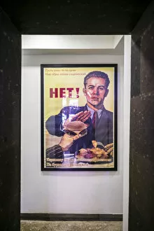Armenia, Yerevan, send up of Soviet-era poster urging comrades NOT to eat American food