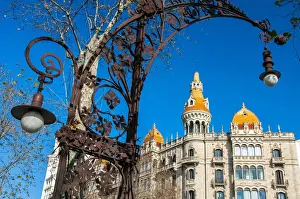 Art nouveau street lamp in Passeig de Gracia with Cases Antoni Rocamora building behind