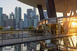 High Rise Prints: ArtScience Museum and skyscrapers of Central Business District at sunset, Singapore