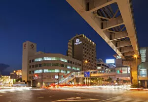 Images Dated 20th January 2014: Asahibashi monorail station and downtown Naha at dusk, Okinawa, Japan