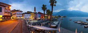 Asconas picturesque Lakeside Promenade and Boat Harbour illuminated at Dusk, Ascona