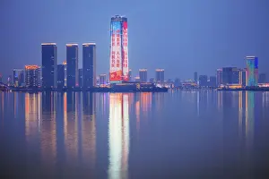 Asia, China, Jiangsu province, the skyline of Yixing city with Lake Taihu in