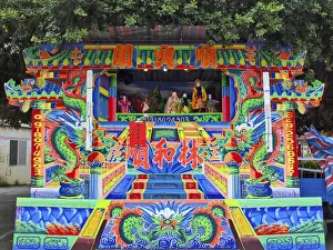 Puppets Prints: Asia, East Asia, Taiwan, a play in a traditional itinerant Chinese puppet theater