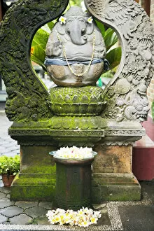 Asia, Indonesia, Bali, Ubud, ganesh statue at the entrance to a traditional home