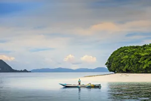 Fisher Prints: Asia, Indonesia, Spice Islands, Ambon, Malona Island, a local fisherman in front of a