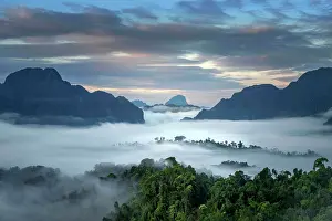 Laotian Prints: Asia, Laos, Vientiane Province, Vang Vieng, karst landscape at dawn, elevated view