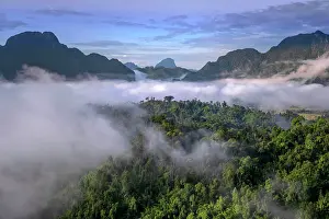 Laotian Prints: Asia, Laos, Vientiane Province, Vang Vieng, karst landscape at dawn, elevated view