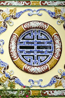 Images Dated 23rd October 2017: Asia, South East Asia, Vietnam; Hue. exterior window decoration on a Vietnamese temple