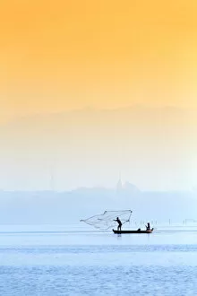 Images Dated 28th April 2015: Asia, Southeast Asia, Myanmar, Mandalay; Amarapura, fishermen on the Taungthaman Lake
