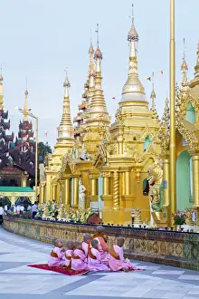 Stupas Prints: Asia, Southeast Asia, Myanmar, nuns praying at the Buddhist temples at the UNESCO
