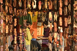Seller Gallery: Asian woman buying shoes in market, Jaipur, India, Asia