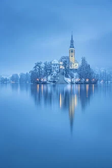 Images Dated 26th June 2023: Assumption of Mary's Pilgrimage Church and Bled Island in snow, Lake Bled, Slovenia