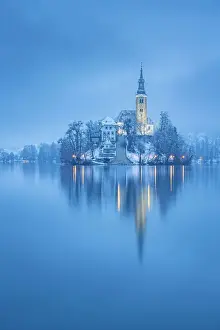 Lake Bled Prints: Assumption of Mary's Pilgrimage Church and Bled Island in snow, Lake Bled, Slovenia